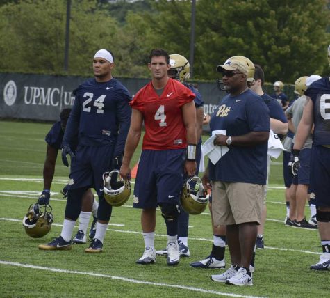 Andre Powell, far right, is both Pitt's special teams and running backs coach. Stephen Caruso / Visual Editor
