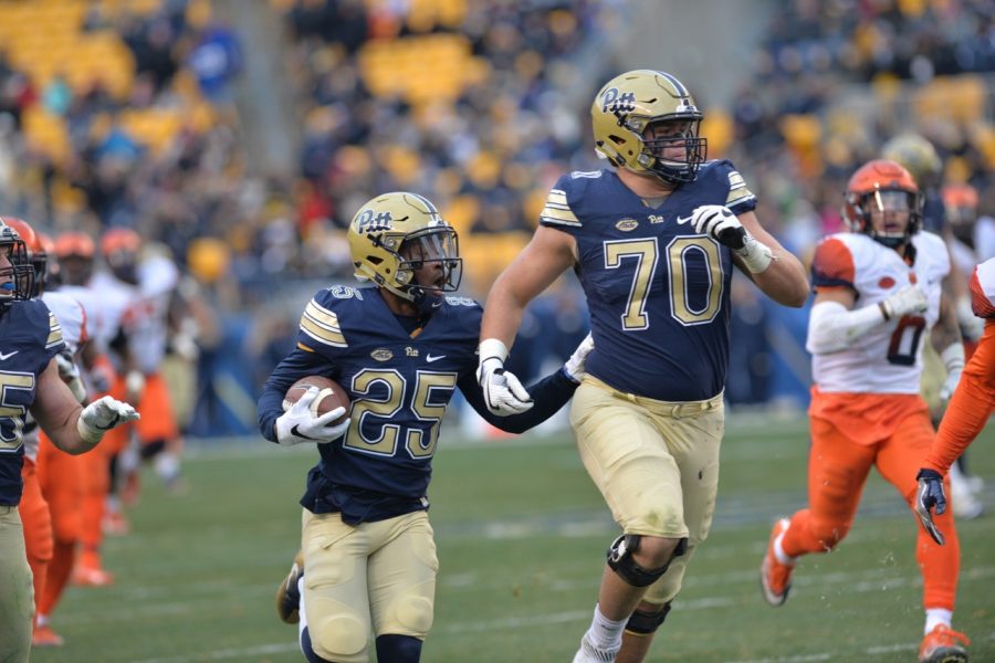 Pitt OL Brian O'Neill (70) helps pave the way to the end zone for Maurice Ffrench. Steve Rotstein | Contributing Editor
