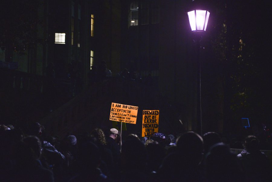 The protest, meant to promote love and tolerance and reject the presidency of Donald Trump, started outside the Cathedral of Learning, where nearly 1000 protesters gathered. Stephen Caruso | Online Visual Editor