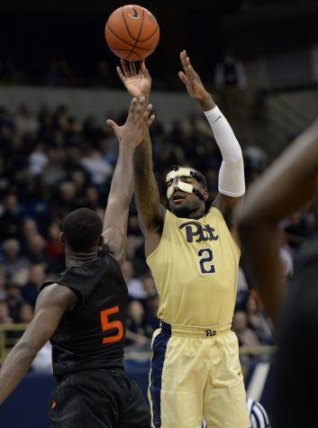 Pitt senior Michael Young finished with just two points on 0-for-10 shooting against Miami while wearing a protective mask for a broken orbital bone. Jeff Ahearn | Senior Staff Photographer