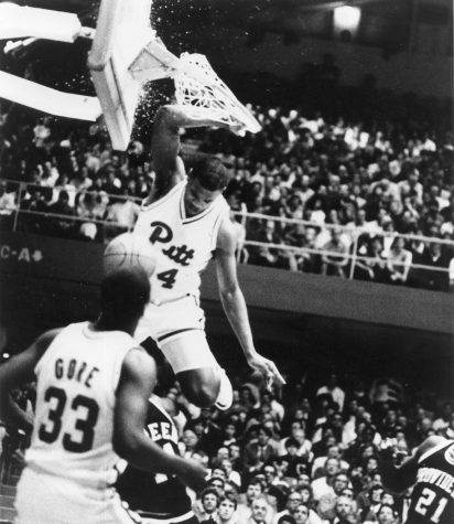 Jerome Lane shatters the backboard at the Fitzgerald Field House with one of college basketball's most memorable slam dunks. Courtesy of Pitt Athletics
