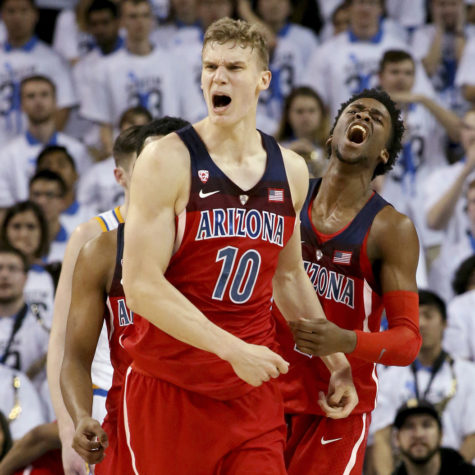 Arizona's Lauri Markkanen (10) celebrates with teammate Kobi Simmons after a dunk against UCLA late in the second half on Saturday, Jan. 21, 2017, at Pauley Pavilion in Los Angeles. Arizona won, 96-85. (Luis Sinco/Los Angeles Times/TNS)