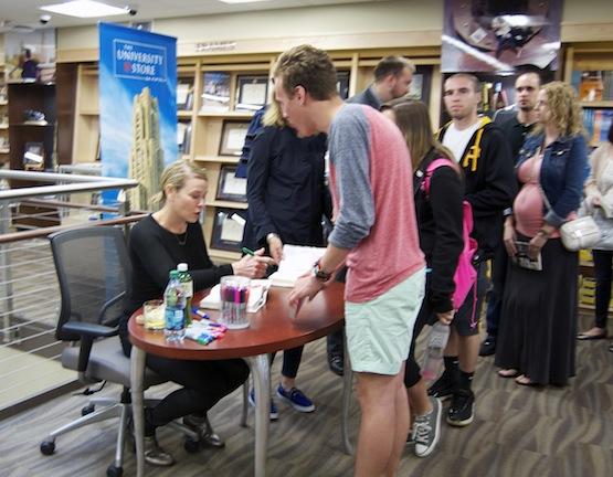 Chelsea Handler autographs books at University Store