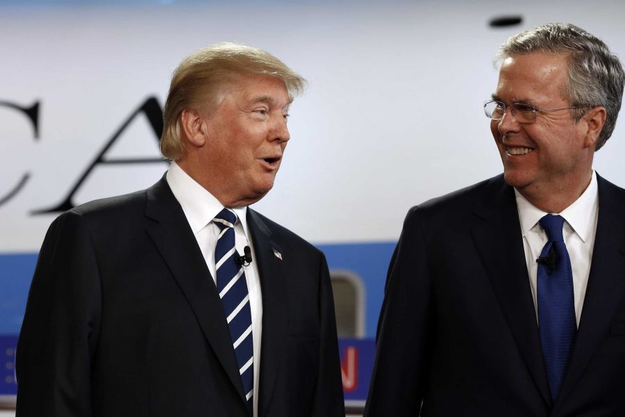Republican presidential candidates Donald Trump and Jeb Bush chat before the start of the debate at the Reagan Library in Simi Valley, Calif., on Wednesday, Sept. 16, 2015. (Rick Loomis/Los Angeles Times/TNS)