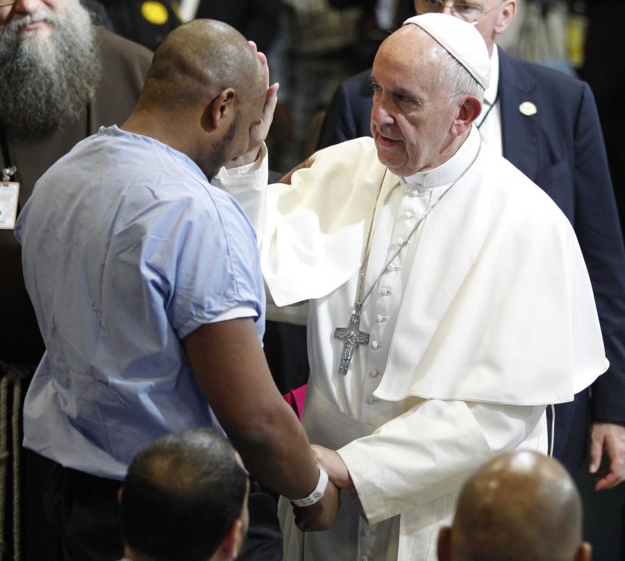 Pope Francis blesses Carlos Lepy during his visit to Curran-Fromhold Correctional Facility on Sunday, Sept. 27, 2015. (Charles Fox/Philadelphia Inquirer/TNS)