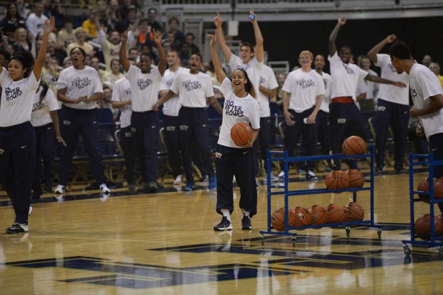 Former Pitt women's basketball start and current WNBA player Brianna Kiesel celebrates as she hits  a half-court shot. | Jeff Ahearn / Assistant Visual Editor