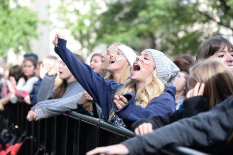 Chantal Lehman and Kathryn Schreiber sing along to Fall Fest opening act, COIN. Meghan Sunners | Senior Staff Photographer