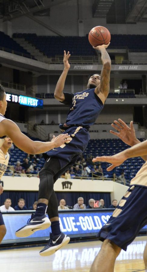 Damon Wilson goes for a shot at the Blue vs. Gold scrimmage on Sunday.  Wenhao Wu | Staff Photographer