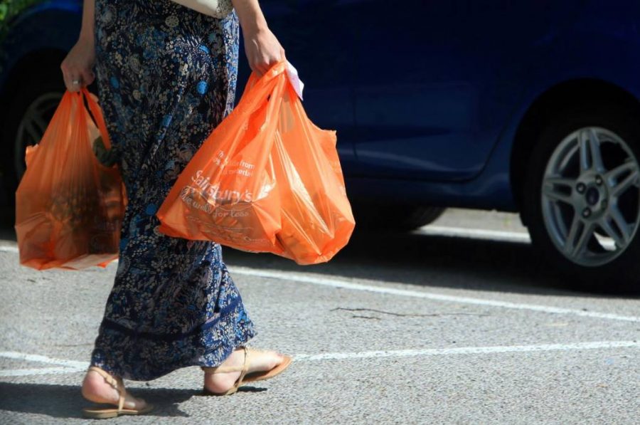 British grocery stores are charging customers to use plastic shopping bags.  Photo by Peter Byrne | Courtesy of the Evening Standard 