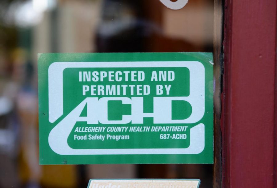 The ACHD rewards restaurants with a green sticker for sufficient health conditions| Photo by Jeff Ahearn 