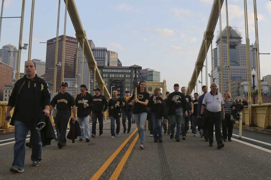 Hoards of Pirates Fans crossed the Roberto Clemente Bridge to get to PNC Park.  Theo Schwarz | Senior Staff Photographer
