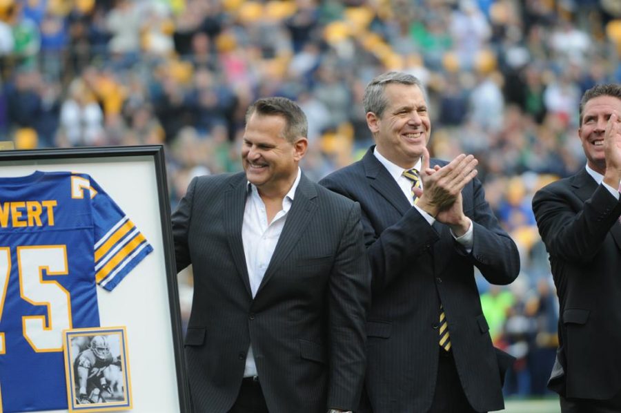 Jim Covert celebrates the retirement of his number, 75, from Pitt Football.  Heather Tennant | Staff Photographer