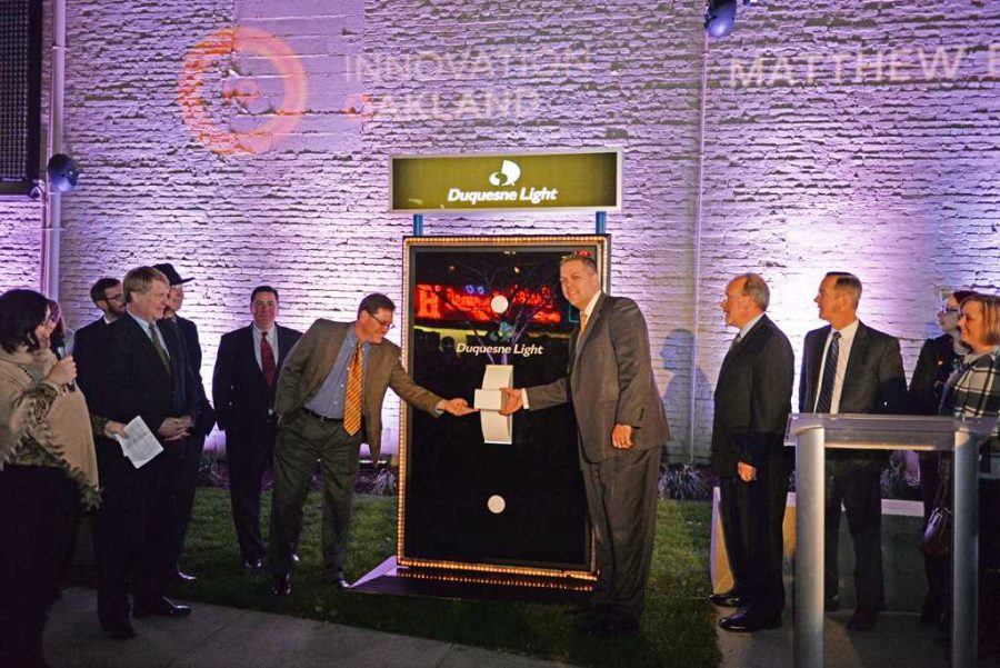 Innovation Oakland officially unveiled the new digital plaza at the corner of Forbes Avenue and South Bouquet Street on Monday night.  Wenhao Wu | Staff Photographer