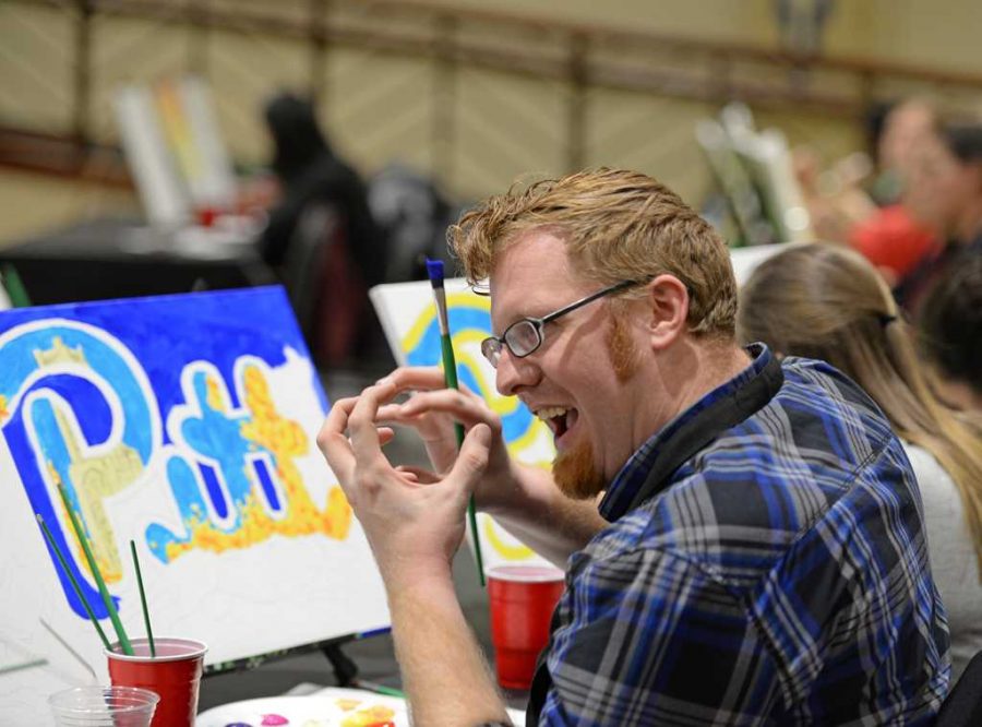 A participant at the Paint with your Professor event. Will Miller | Staff Photographer