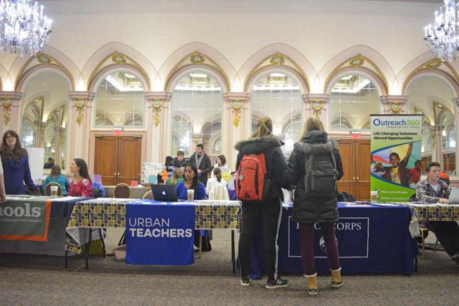 Students gather around tables in the William Pitt Union on Wednesday to learn about and sign up for volunteer activities during a PittServes volunteer fair.  Valkyrie Speaker | Staff Photographer 