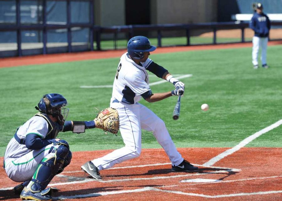 Ron Sherman (18) takes a swing at a pitch in a game last year.  Pitt New File Photo