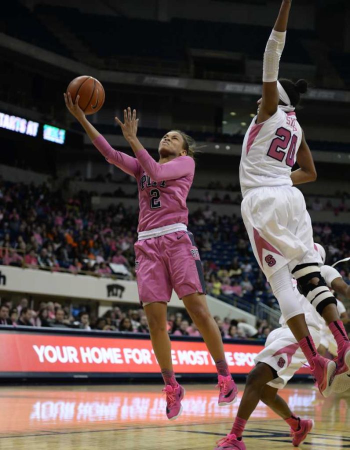 Aysia Bugg attempts a layup against Syracuse in the Pink The Pete matchup.  Emily Klenk | Staff Photographer