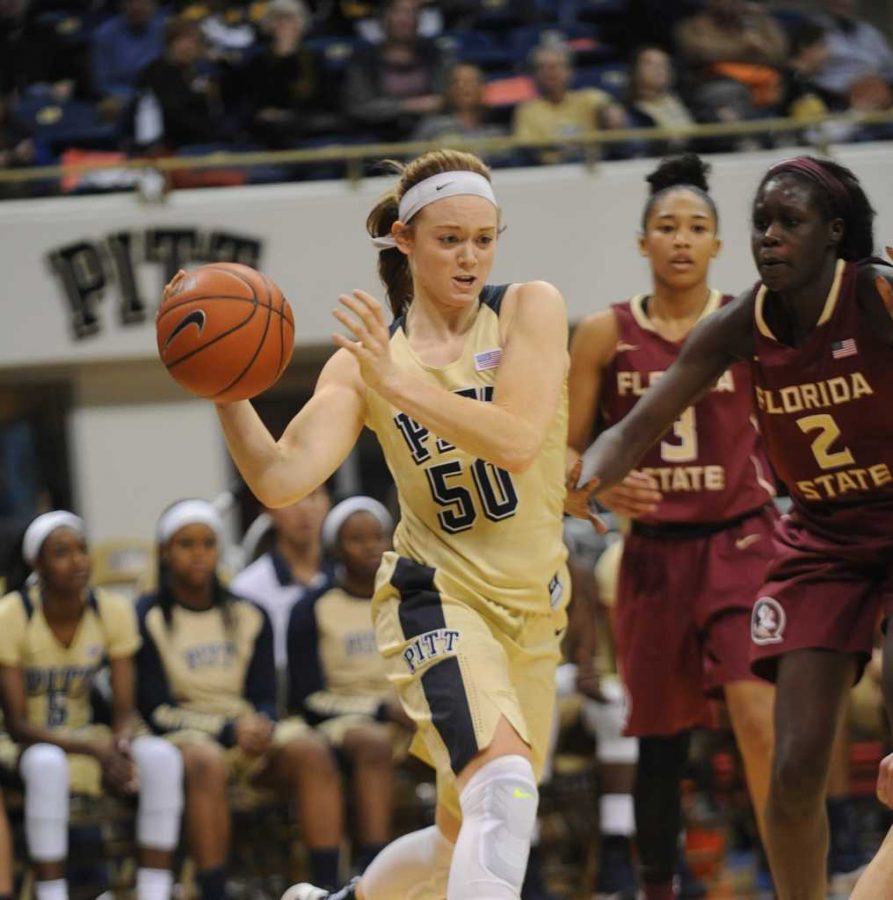 Brenna Wise dribbles past Florida State defenders.  Jeff Ahearn | Assistant Visual Editor