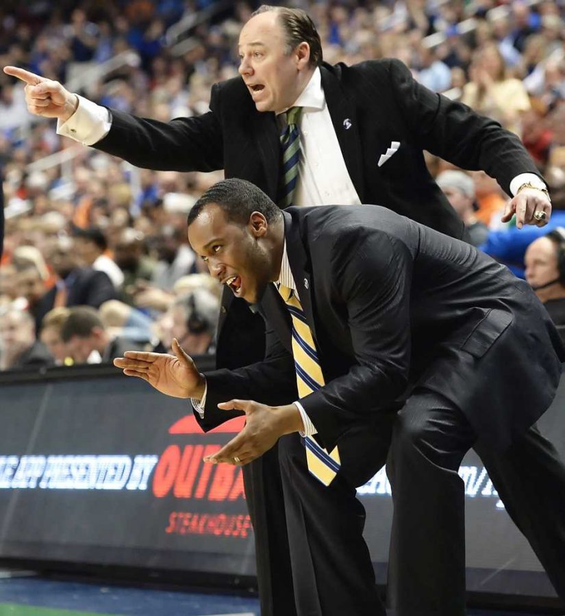 Pittsburgh assistant coaches Barry Rohrssen and Brandin Knight call out to their team as they take on Virginia in the second half of the semifinals of the ACC Tournament in Greensboro, N.C., Saturday, March 15, 2014. Virginia defeated Pitt, 51-48. (Matt Freed/Pittsburgh Post-Gazette/MCT)