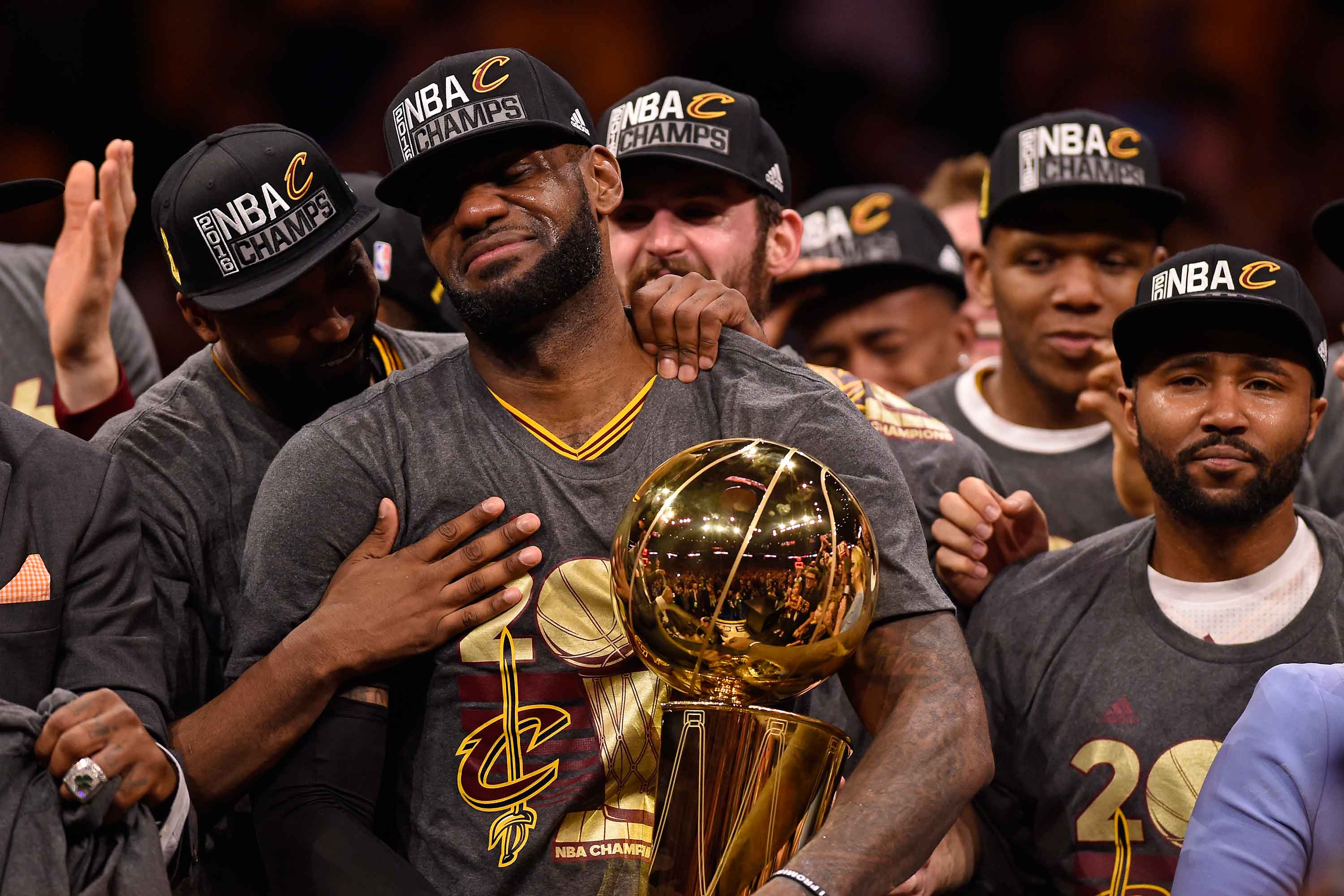 LeBron James, Kyrie Irving lead Cavs to improbable NBA title
