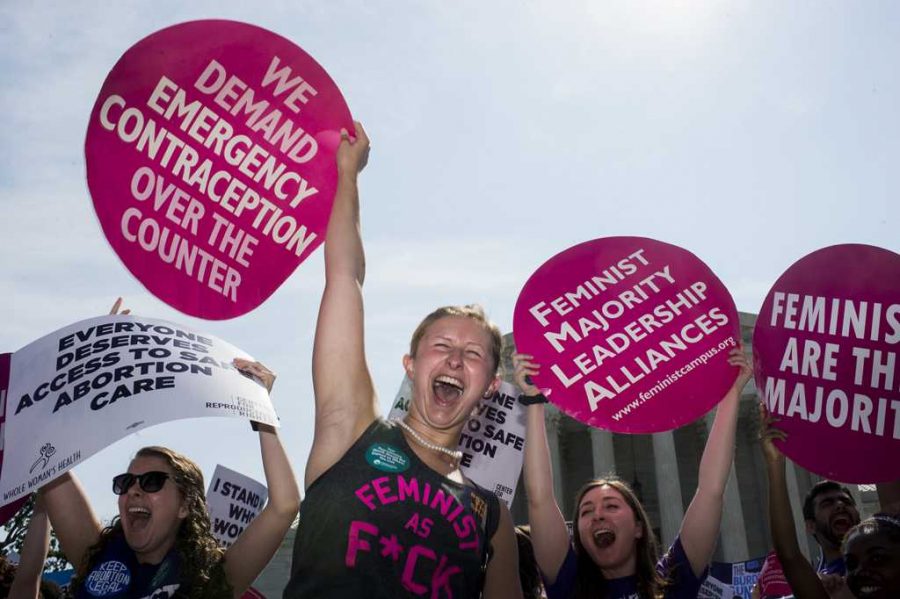 Pro-choice demonstrators at the U.S. Supreme Court cheer as they learn the court struck down the Texas abortion law on Monday, June 27, 2016 in Washington, D.C. (Bill Clark/Congressional Quarterly/Newscom/Zuma Press/TNS)