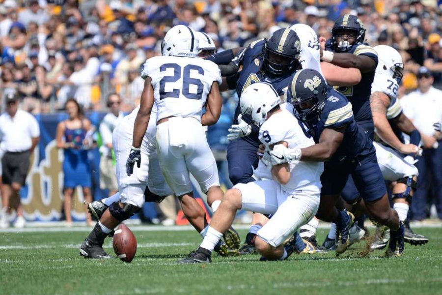Ejuan Price causes Penn State quarterback Trace McSorley to fumble earlier in the season. Jeff Ahearn | Senior Staff Photographer
