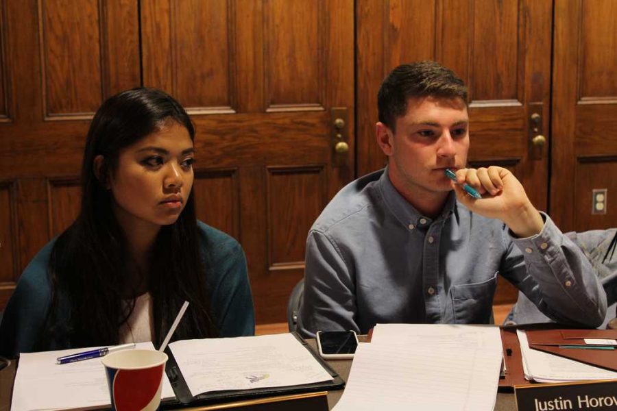 Justin Horowitz and Alyssa Laguerta listen to audience members intently during Tuesday nights weekly meeting. Katie Krater | Staff Photographer