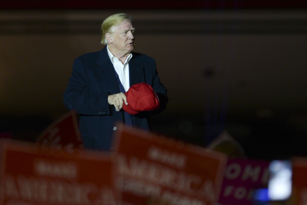Trump briefly removes his hat after his speech. John Hamilton | Senior Staff Photographer