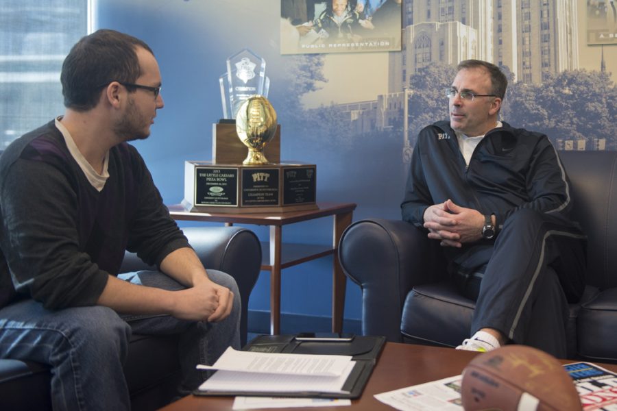Dan Sostek chats with Pitt football head coach Pat Narduzzi. Jeff Ahearn | Senior Staff Photographer