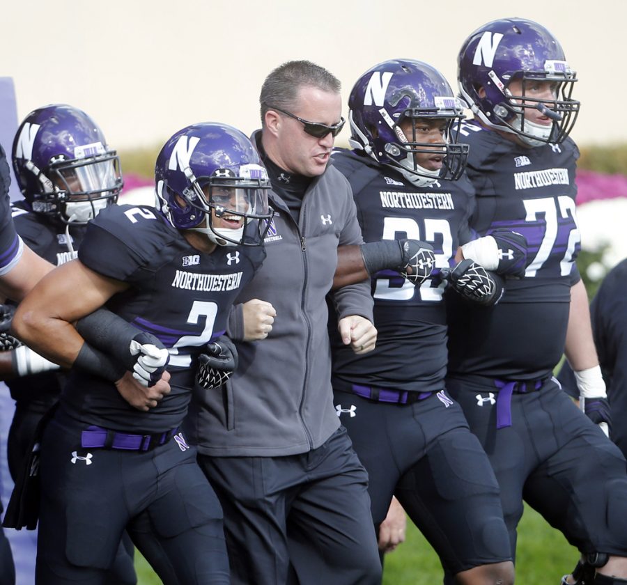 Northwestern head coach Pat Fitzgerald has returned the Wildcats to prominence after leading them to two Big Ten titles as a player in 1995 and 1996. (TNS)