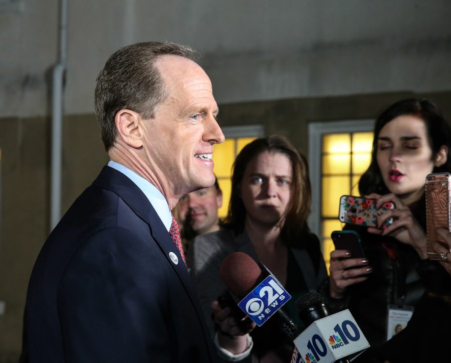 Sen. Pat Toomey (R-Pa.) talks with the media after voting in Zionsville, Pa., on Tuesday, Nov. 8, 2016. (Steven M. Falk/Philadelphia Inquirer/TNS)