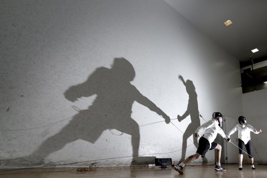 Theo Schwarz took 2nd place in the feature photo category for his photo of two fencers and their shadows. 