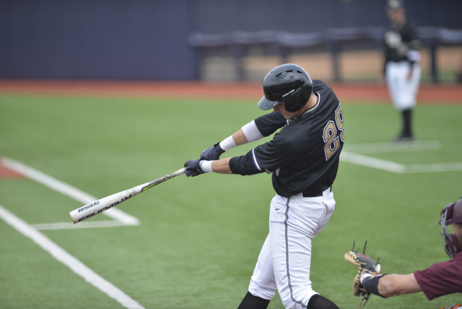 Nick Banman hit a home run on Saturday in this weekends sweep at the hands of the No. 22 Virginia Cavaliers. Stephen Caruso | Assistant Visual Editor