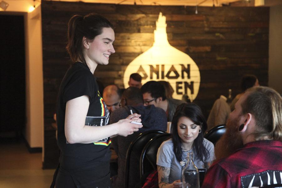 Rose Barlow from Pitt is serving table at the Onion Maiden. Julia Zhu | Staff Photographer