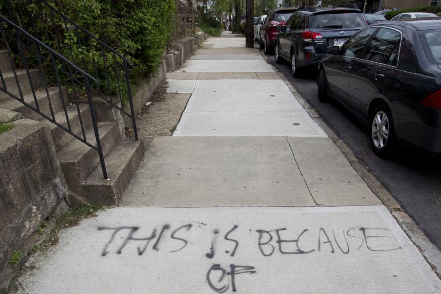 Two females not affiliated with the University were arrested in connection with graffiti on Meyran Avenue Tuesday morning. John Hamilton | Contributing Editor