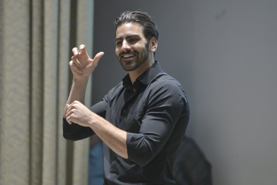 Nyle DiMarco, a deaf activist and model, advocatdes for the Deaf community and shares his life experiences on Monday at Frick Fine Arts. Meghan Sunners | Visual Editor