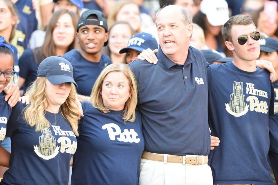 Basketball coaches Suzie McConnell-Serio and Kevin Stallings sing Sweet Caroline with students during the 2016 season. (Photo by Matt Hawley / Staff Photographer)