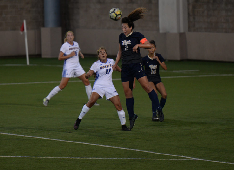 Pitt senior Emma Pozzulo (2) heads the ball out of danger in the teams Friday night win over Hofstra. (Photo by Anna Bongardino | Visual Editor)