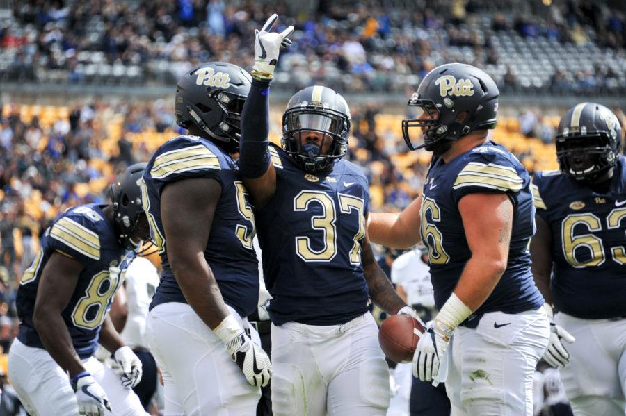 Qadree Ollison (37) celebrates after his first quarter touchdown. Photo by Wenhao Wu | Assistant Visual Editor