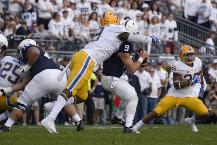 Dewayne Hendrix, pictured here sacking Penn State quarterback Trace McSorley in 2017, was signed by the Miami Dolphins as an undrafted free agent. (Photo by Wenhao Wu / Assistant Visual Editor)