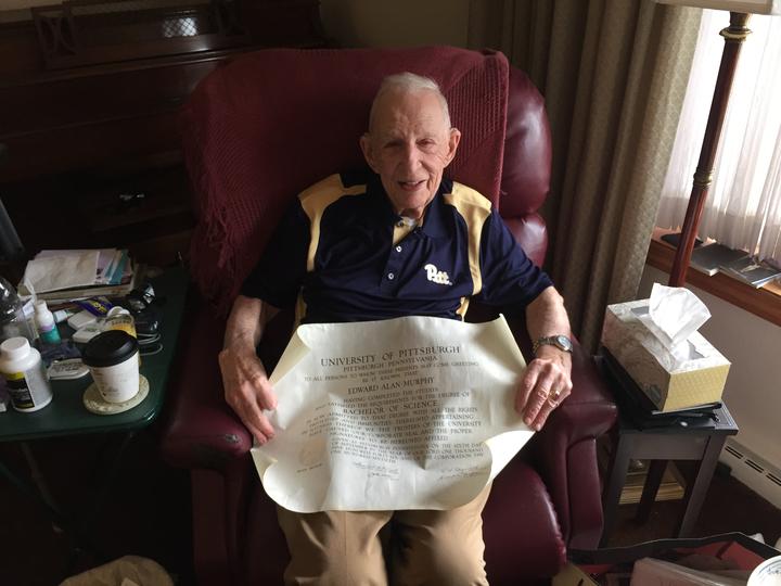 Edward Murphy, pitt class of 1941, holds his diploma in hands. (Photo by Bailey Frisco | Staff Writer) 