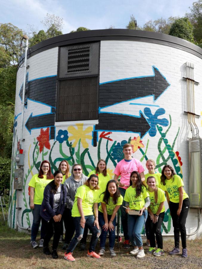Students took a group picture after they painted a mural in Greenfield during PMADD 2017. (Photo courtesy of Student Affairs Marketing and Communication)
