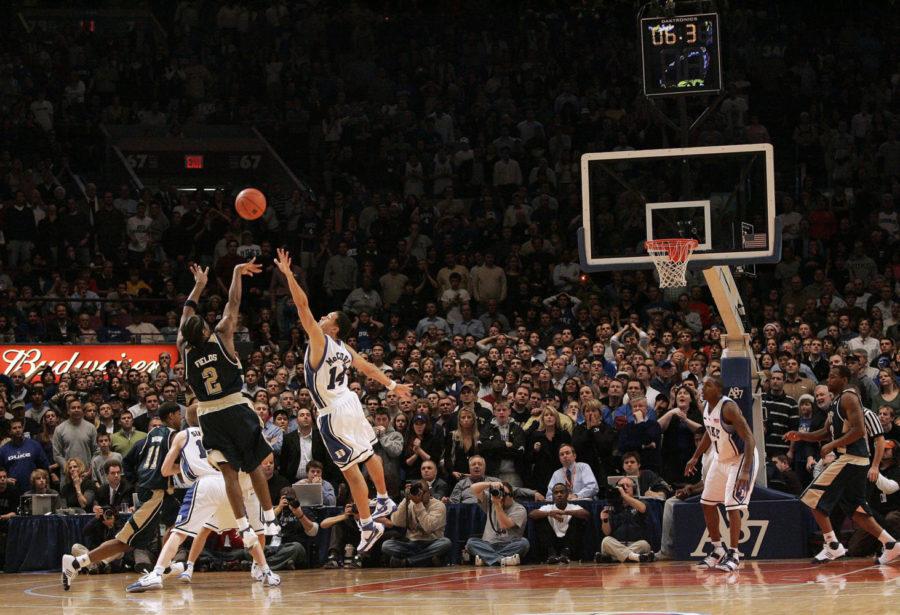 Pitts Levance Fields (2) shoots the game-winning three with six seconds remaining in overtime. Pitt defeated Duke, 65-64, at Madison Square Garden in New York City, Thursday, December 20, 2007. (Ted Richardson/Raleigh News & Observer/MCT)