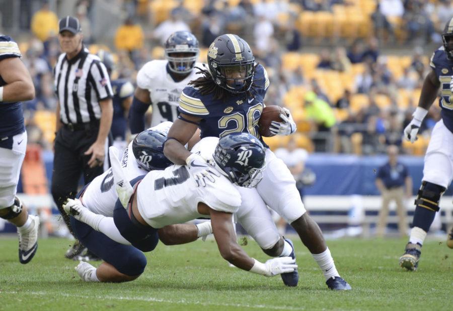 Running back Chawntez Moss rushes against Rice in September. Moss will not return to the Panthers football team next year. (Photo by Thomas Yang / Senior Staff Photographer)