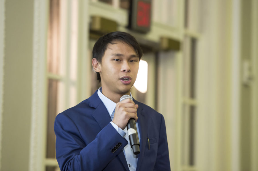 Senior mechanical engineering major Dan Chi promotes Four Growers, a company started by Chi and his friend Brandon Contino that is devoted to creating tomato-harvesting robots to work in greenhouses. (Photo courtesy of Karen Woolstrum)