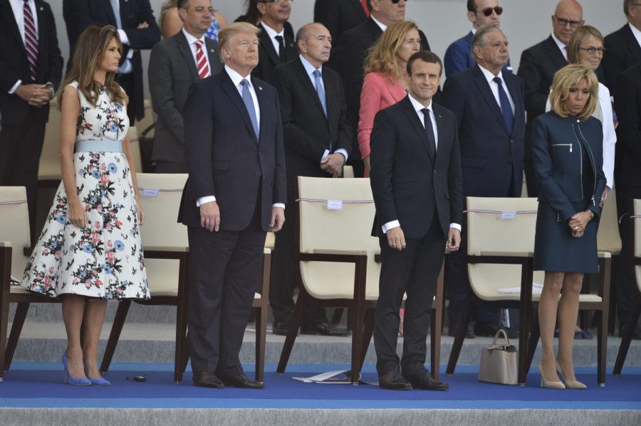 President Donald Trump, first lady Melania Trump and French President Emmanuel Macron, along with Brigitte Macron, attend the annual Bastille Day military parade on Champs-Elysees Avenue in Paris July 14, 2017. (Lionel Hahn/Abaca Press/TNS)