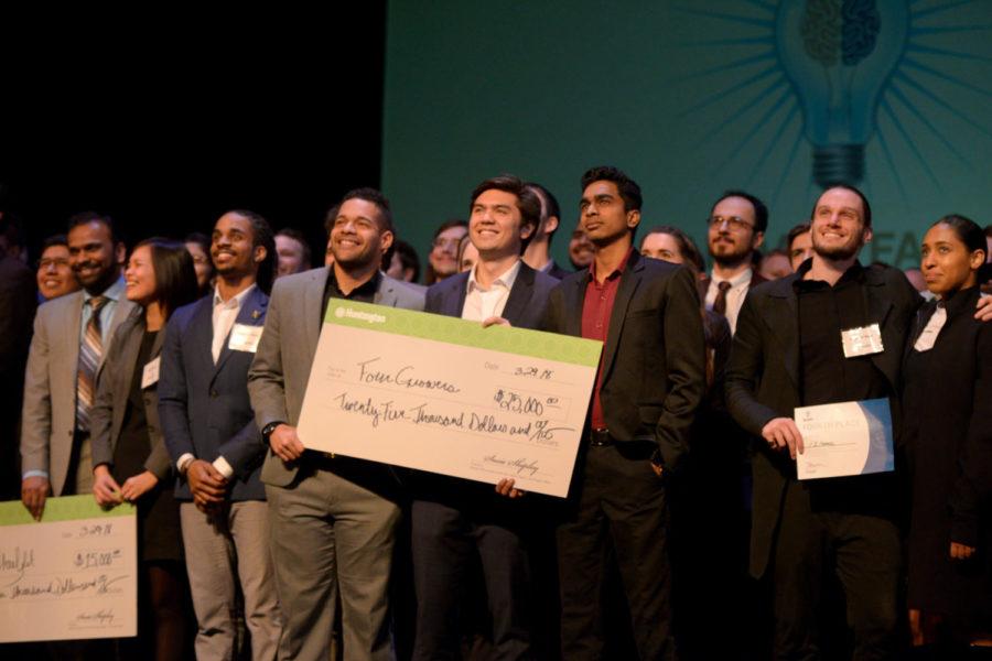 (From left) Daniel Garcia, Brandon Contino and Rahul Ramakrishnan of Four Growers accept first place at the Randall Family Big Idea Competition Celebration event Thursday afternoon. (Photo by Divyanka Bhatia | Staff Photographer)