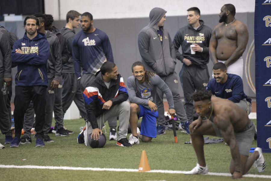 The Pitt football team casually stands around and spectates teammates undergoing various tests in the UPMC Rooney Sports Complex. (Photo by Mackenzie Rodrigues | Contributing Editor)