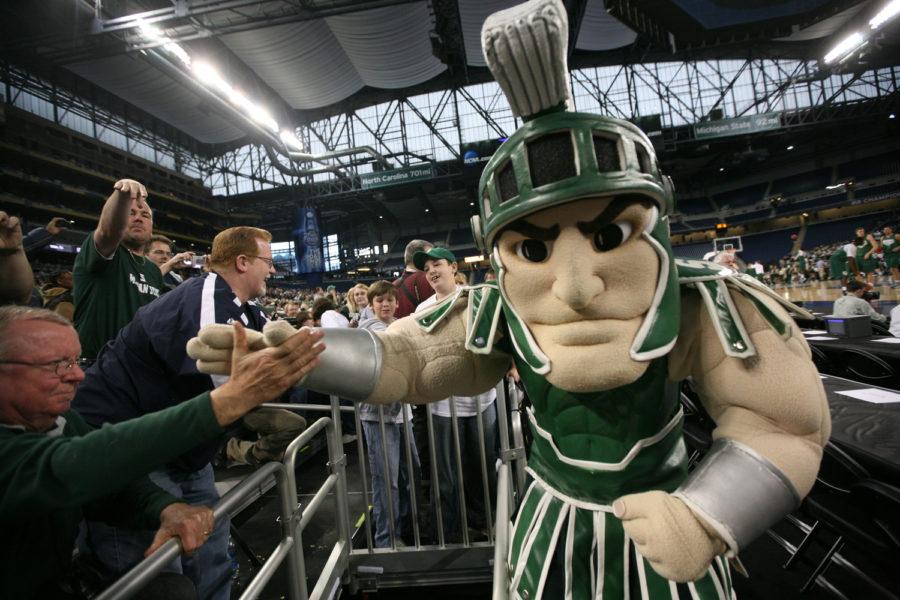 Michigan+State+mascot+Sparty+high+fives+fans+as+they+wait+for+the+players+to+come+onto+the+court+for+practice+for+the+Final+Four+at+Ford+Field+in+Detroit+in+2009.+%28Andre+J.+Jackson%2FDetroit+Free+Press%2FMCT%29%0A