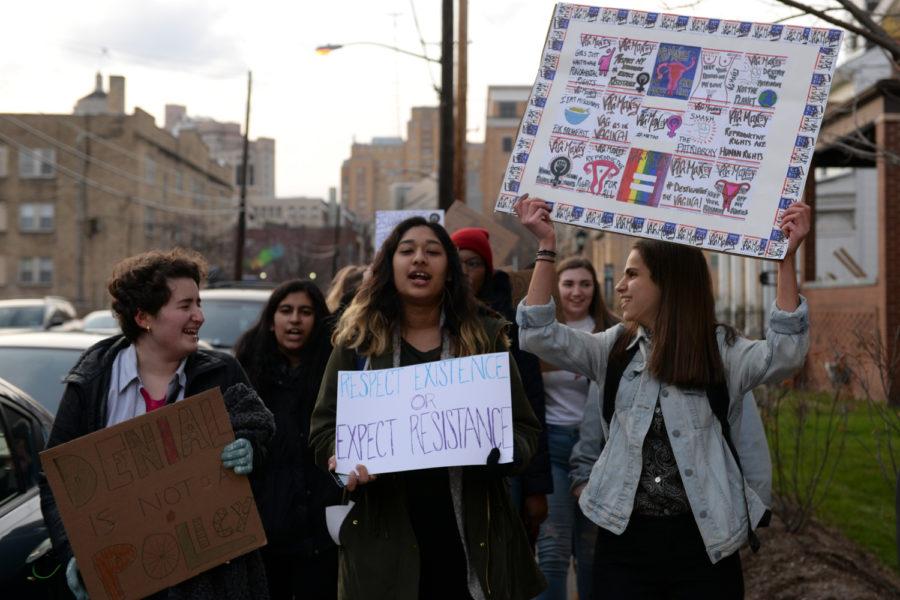 Members of the Pitt Progressives’ Socialist Feminist Working Group march as a part of the group’s “You Deserve, We Deserve” week. (Photo by Divyanka Bhatia | Staff Photographer)
